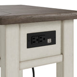 Integrated USB charging ports close-up on Bolanburg end table
