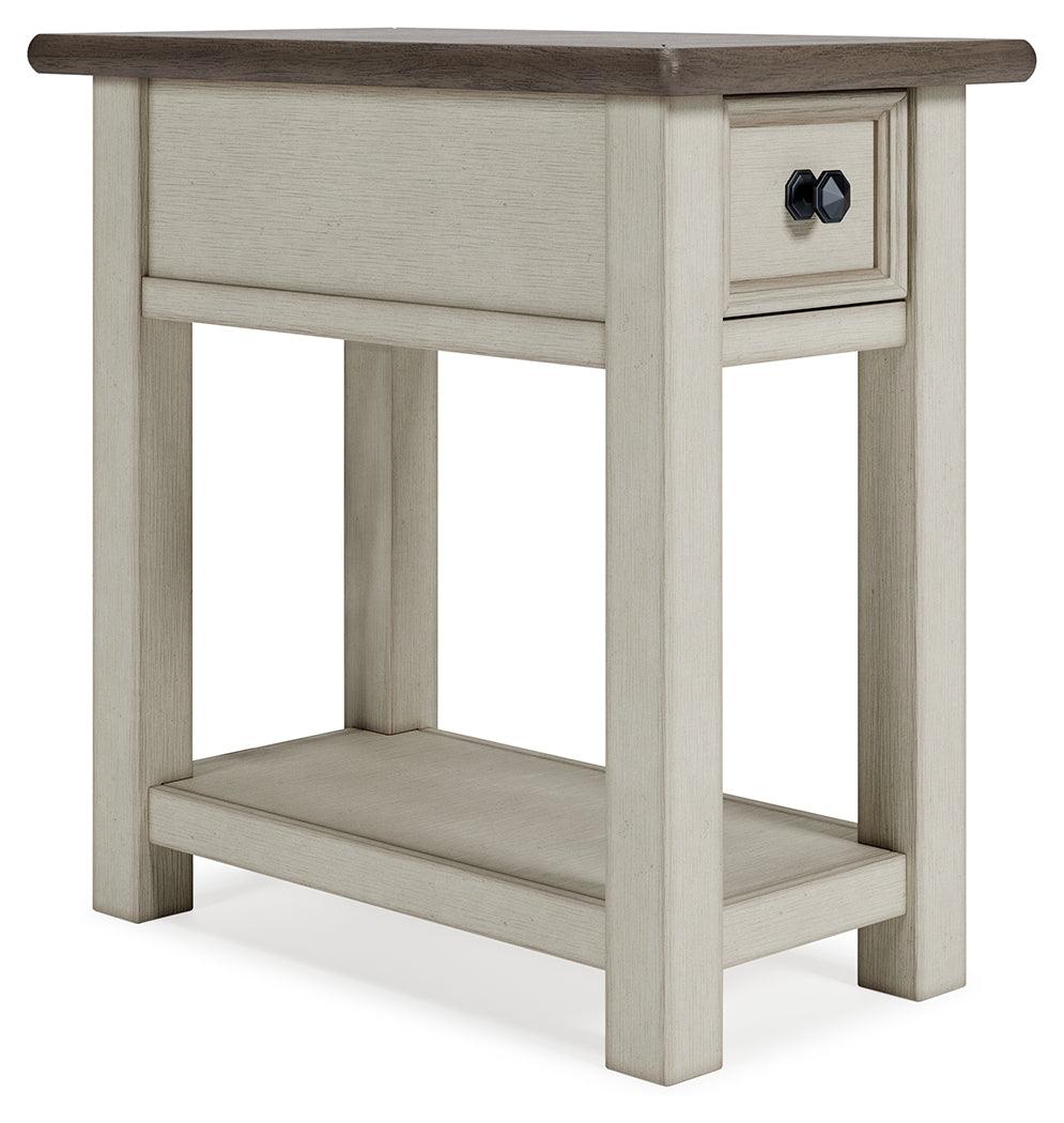 Side view of Bolanburg two-tone end table with drawer open