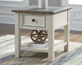 Opened drawer of Bolanburg two-tone end table showing smooth glide