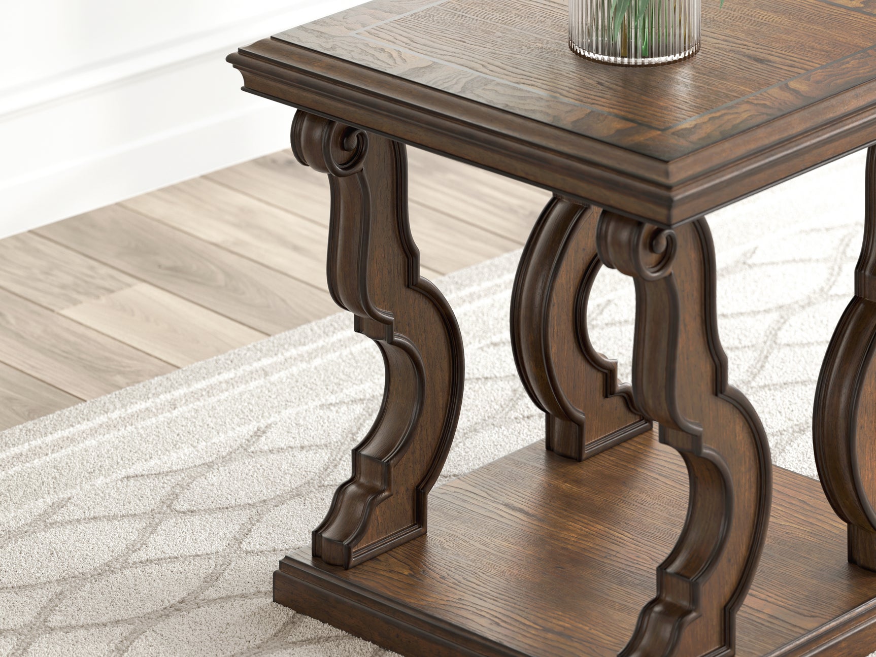 Close-up of ornate apron and scrolled leg detail on Maylee end table