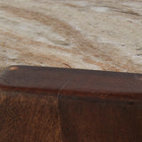 Tanidore warm brown coffee table with marble top and two matching end tables