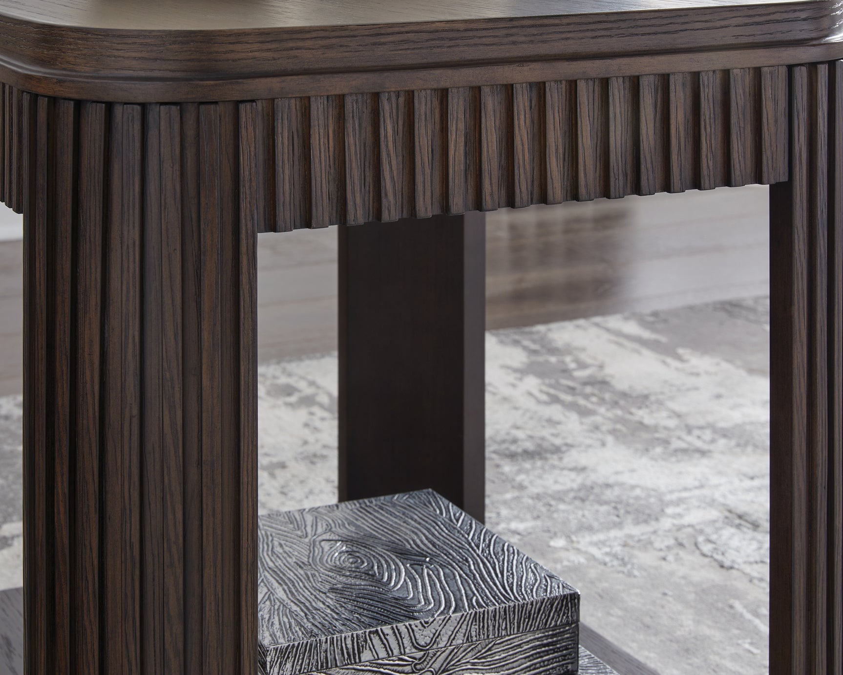 Close-up on Carlibrie end table fluted apron detail