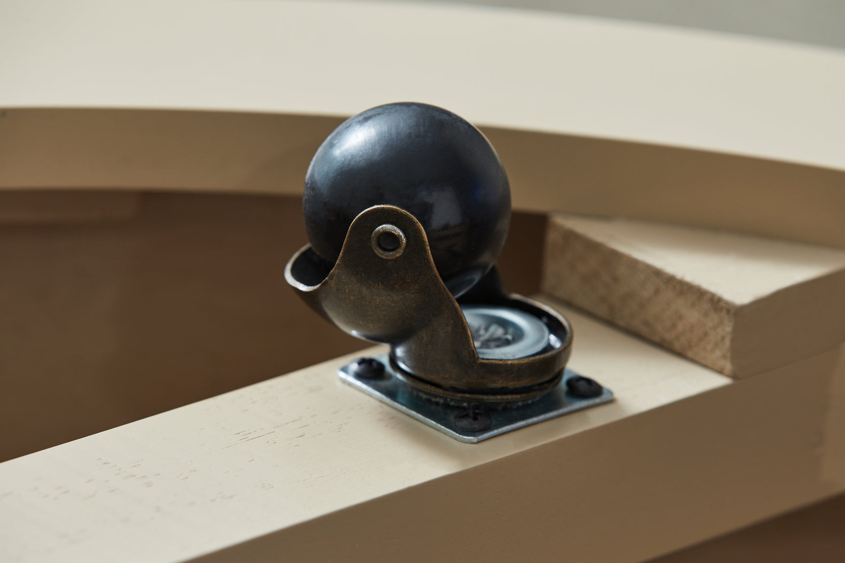 Jorielyn Coffee Table caster close-up
