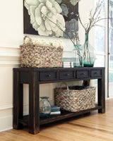 Close-up of drawer with bronze hardware on Gavelston Table