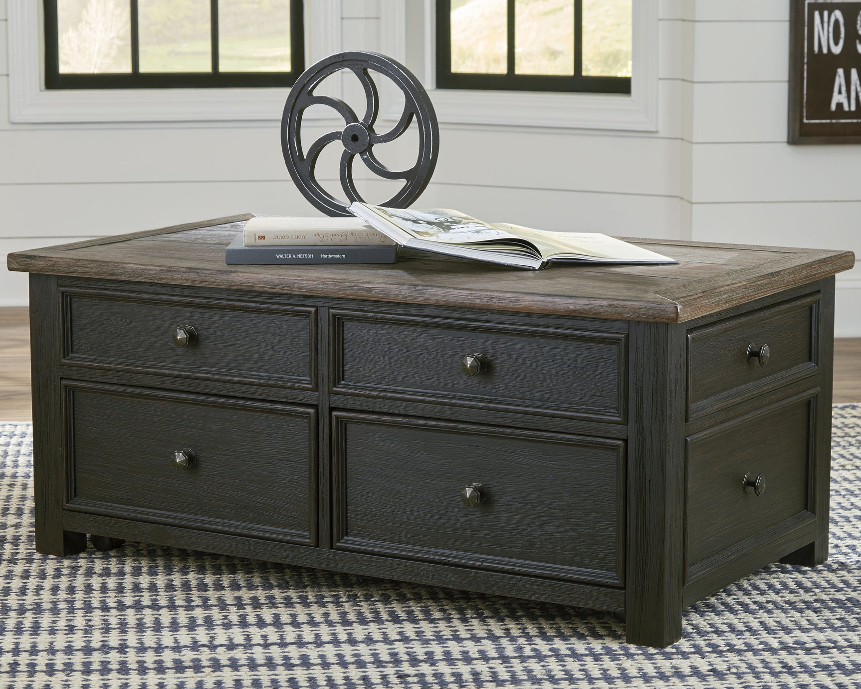 Lift top mechanism on coffee table in open position