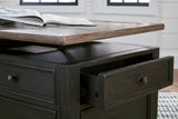 Tyler Creek grayish brown and black coffee table with lift top and end table