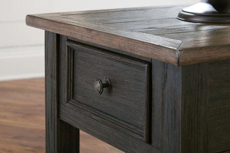 Tyler Creek grayish brown and black coffee table with lift top and end table