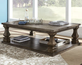 View of sturdy square baluster legs on coffee table