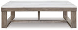 Side profile of Loyaska Brown Ivory Coffee Table with blocky design
