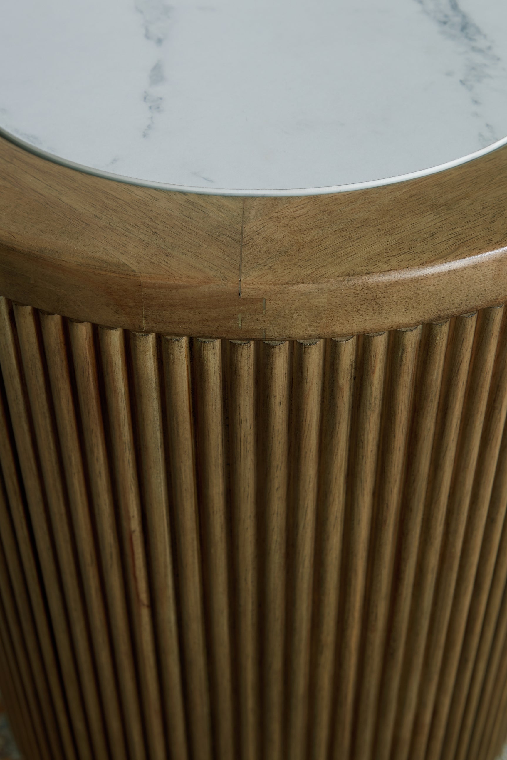 Close-up detail of reeded wood base on Camdill End Table