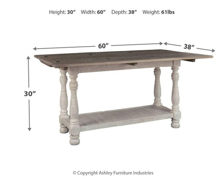 Close-up of weathered gray top and vintage white base finish on Havalance table