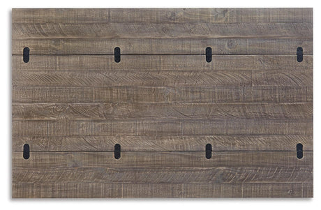 Detail of distressed two-tone finish on Havalance sofa console table