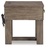 Loyaska coffee table with two end tables arranged in living room