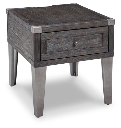 End table from Todoe set showing canted metal legs and surface