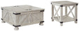 Carynhurst whitewash end table, angled view