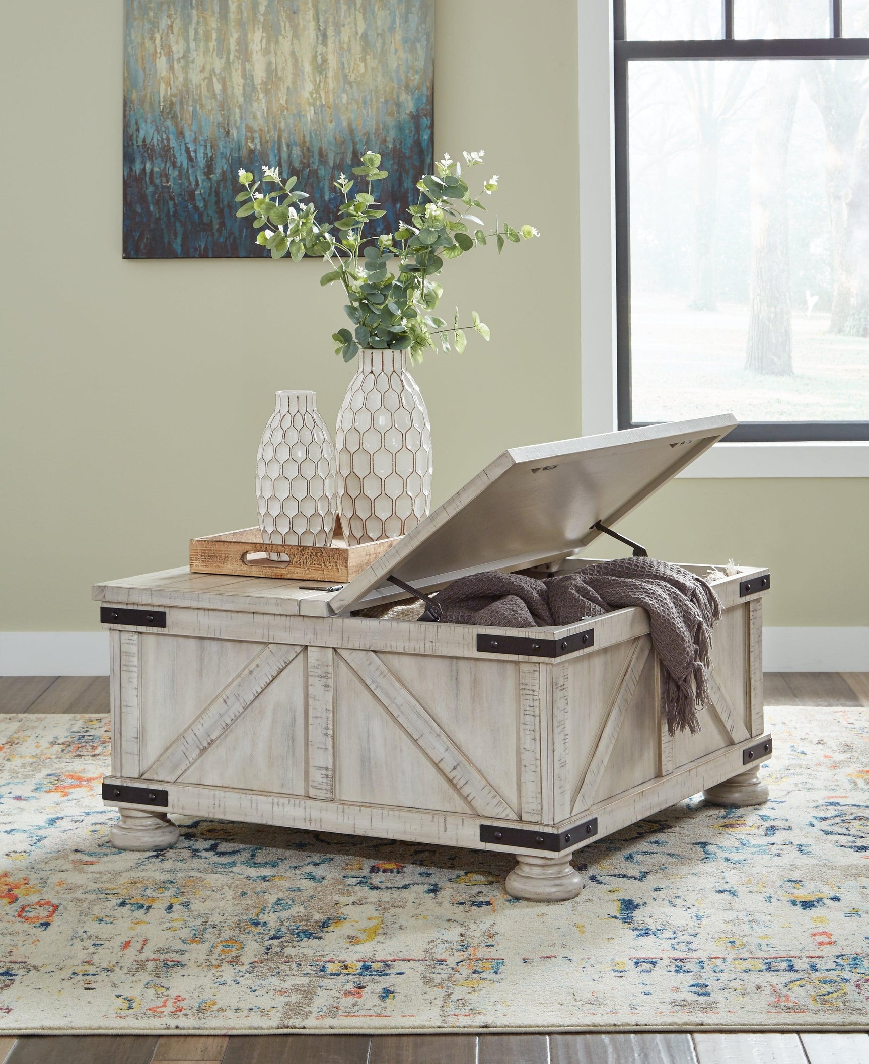 Open storage compartments inside Carynhurst coffee table