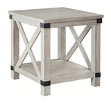 Carynhurst whitewash end table angled side view