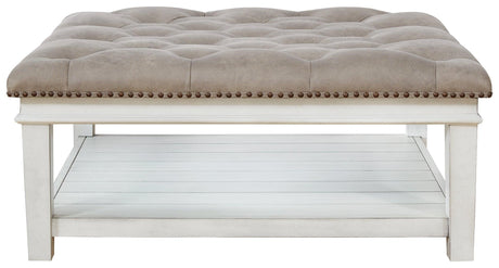 Kanwyn Whitewash Upholstered Ottoman Coffee Table nailhead trim detail