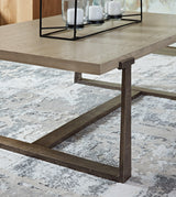 Dalenville Gray Coffee Table close-up of distressed aluminum base detail