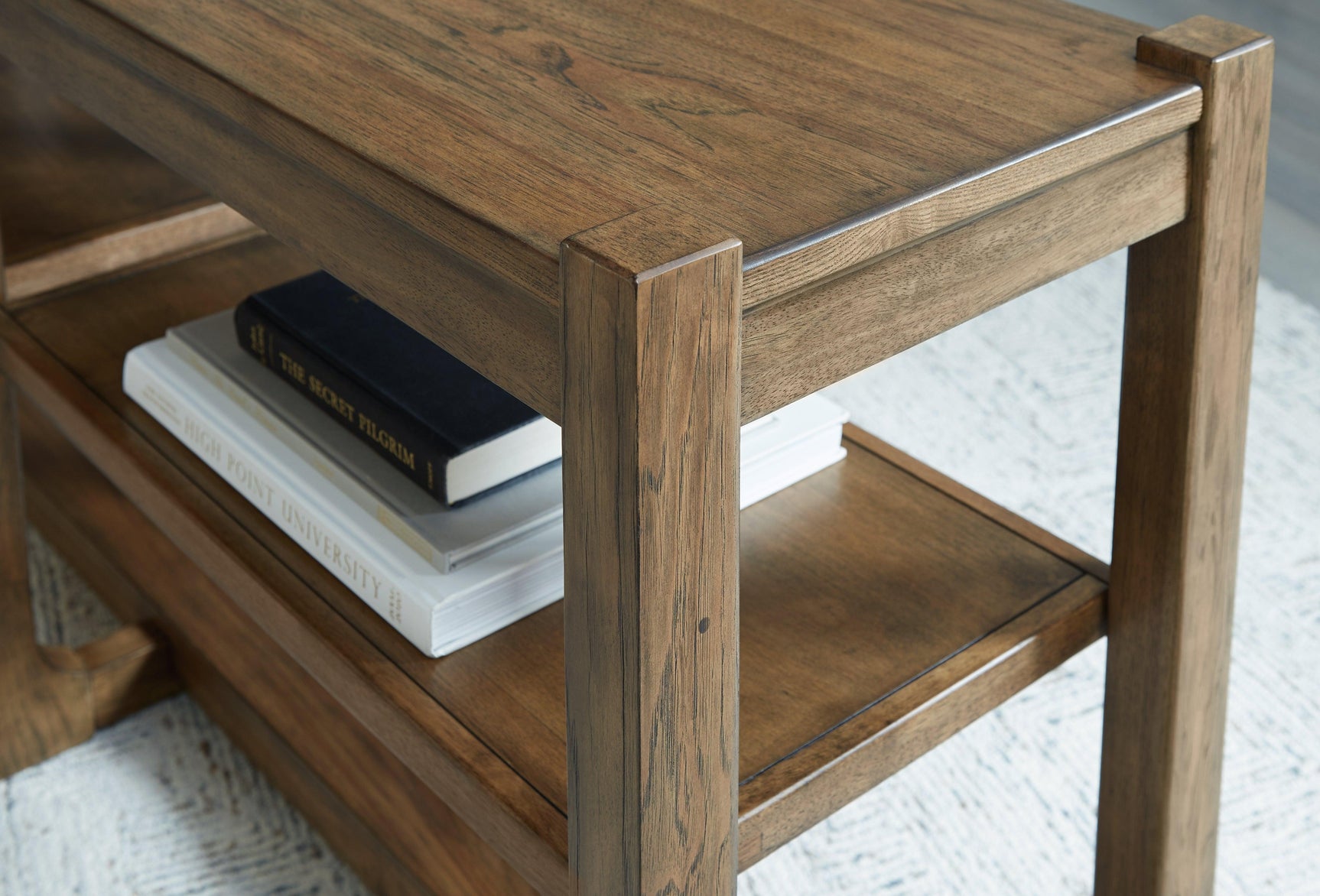 Cabalynn Light Brown Sofa Table light brown glazed finish detail