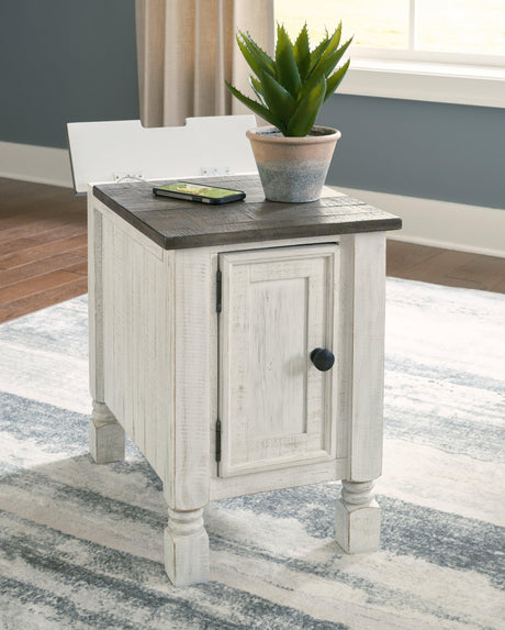 Top lid open showing hidden power outlet and USB ports