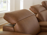 Adjustable Easy View headrest on sectional recliner