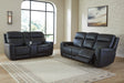 Onyx faux leather upholstery close-up with contrast welting detail