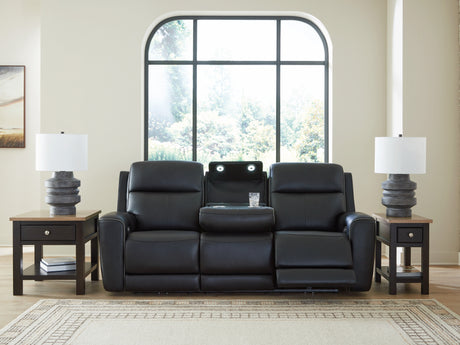 Drop-down table with LED lights and dual cup holders open on sofa
