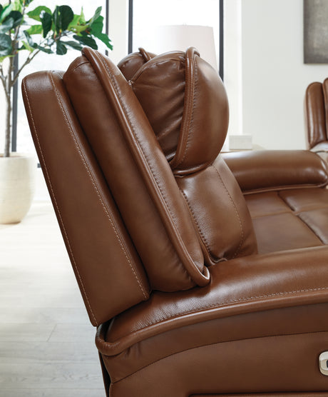 Power reclining control buttons on sofa arm