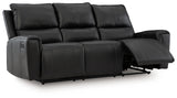 Glossmore reclining sofa showing open recliners
