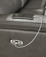 USB-A and USB-C charging ports built into sectional arm