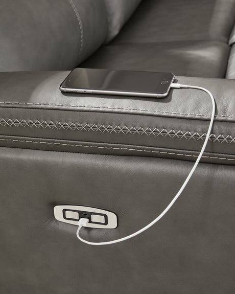 USB-A and USB-C charging ports built into sectional arm