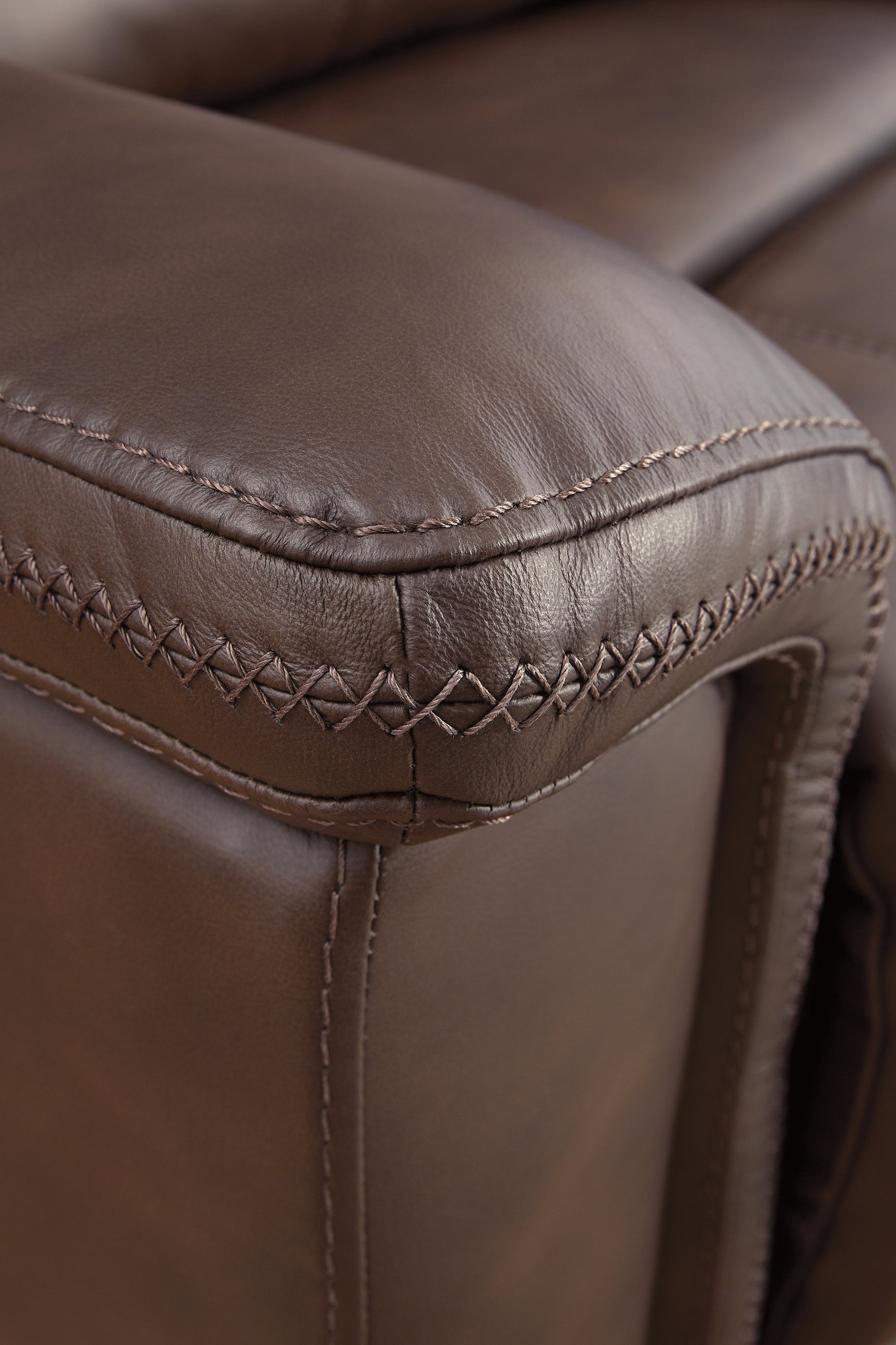 Close-up of stitch detail on leather upholstery
