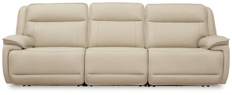 Left-arm facing power recliner showing adjustable headrest