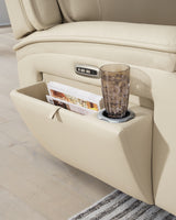 Armrest with pop-out storage and cup holder