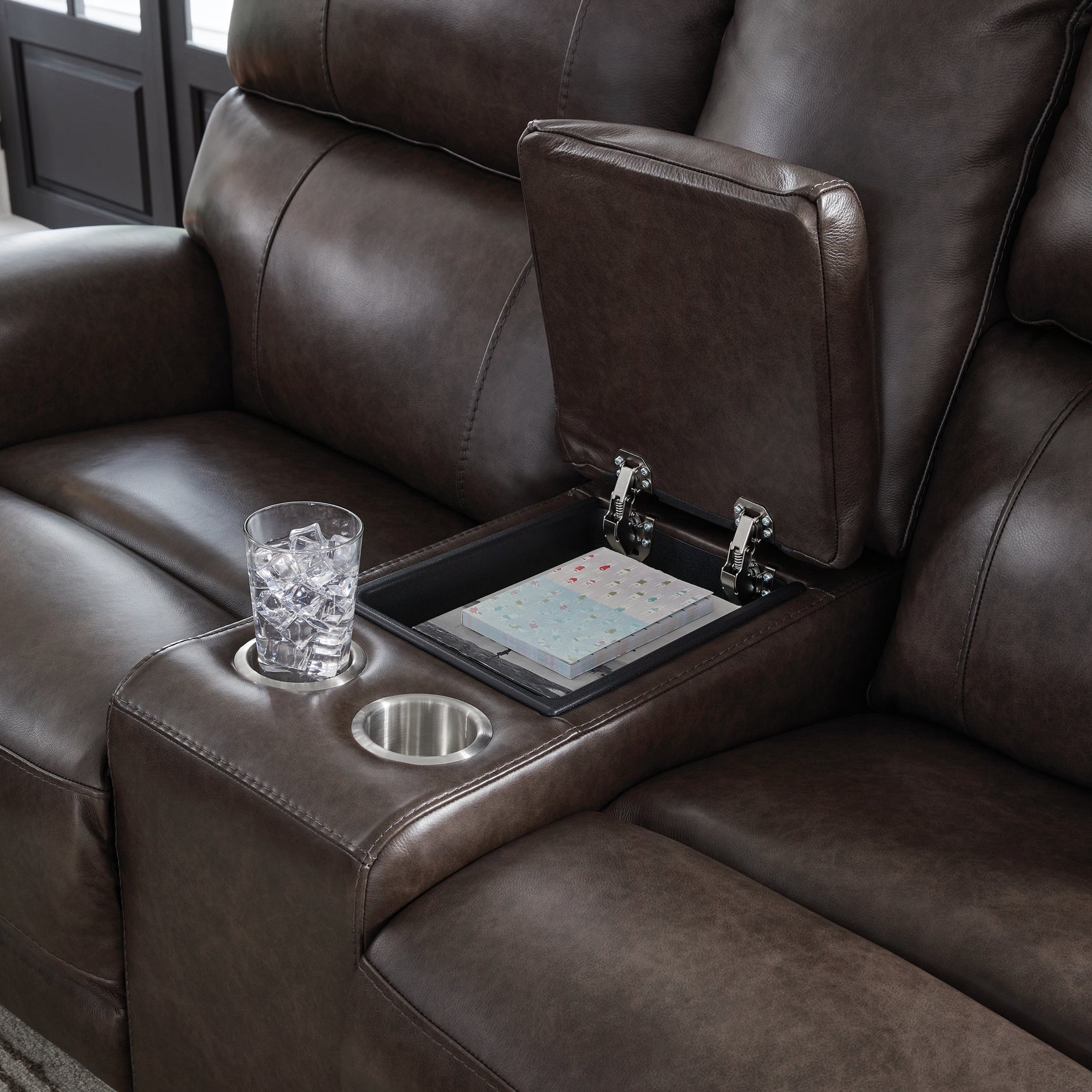 Console area with USB ports on loveseat