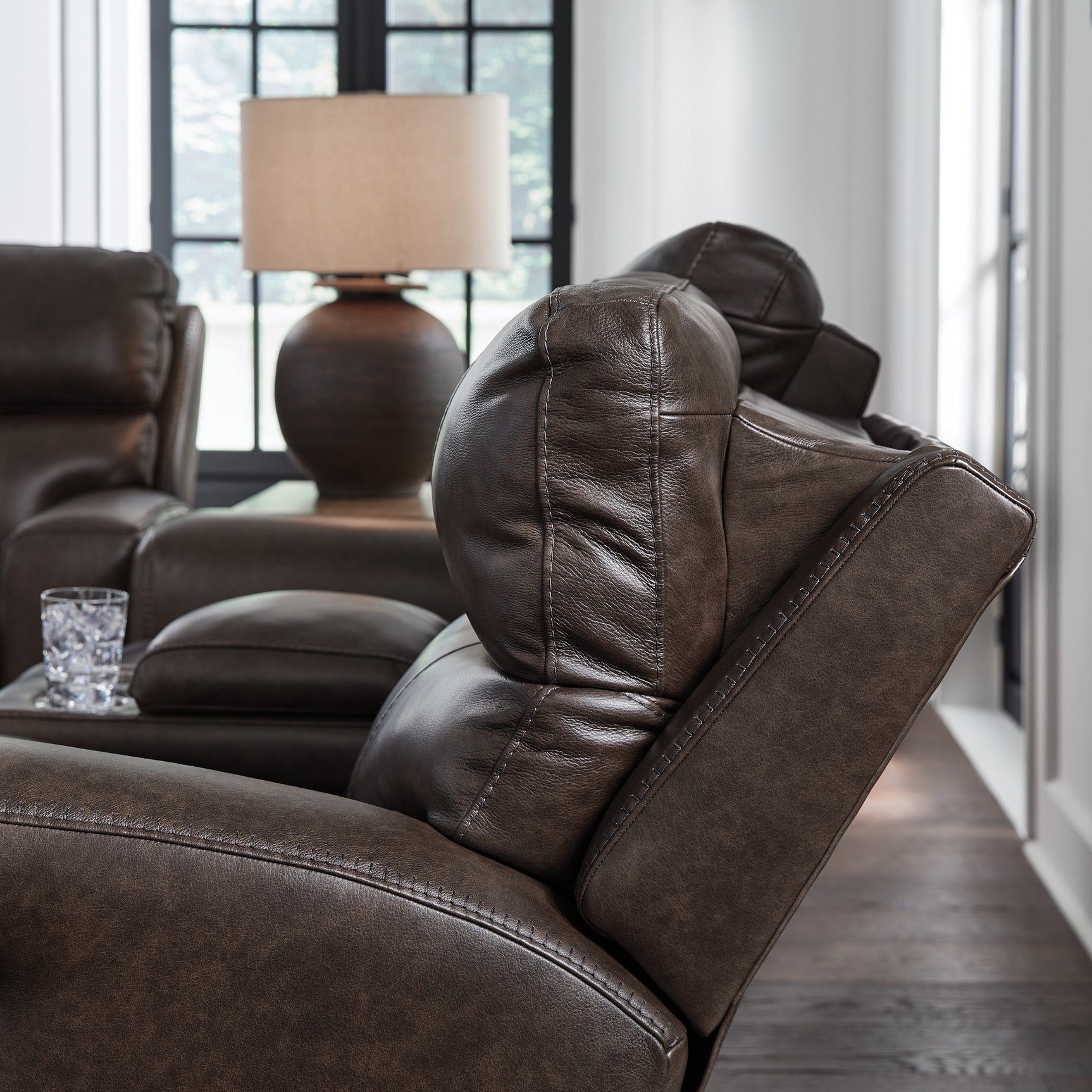 Adjustable headrest detail on sofa