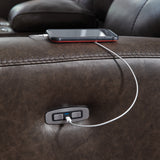Power USB port and jumbo stitching detail on armrest