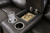Center console detail with cup holders and storage