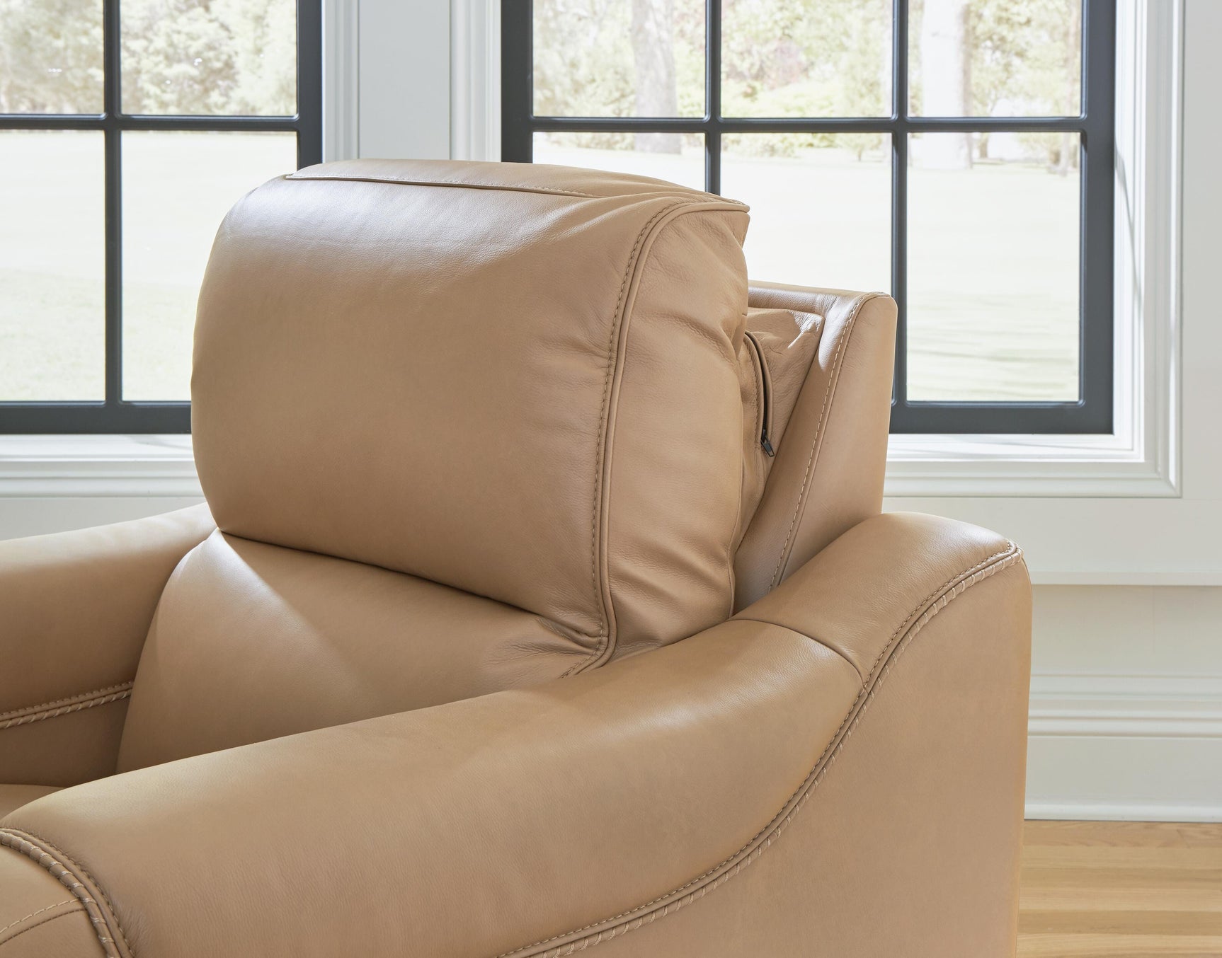 Close-up of toffee leather upholstery texture