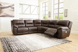 Side view of Dunleith power reclining sectional with extended ottoman