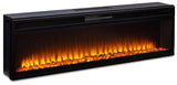 Close-up of natural rock and faux glass inserts in electric fireplace