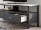 Decorative elements on Cadmori TV stand surface