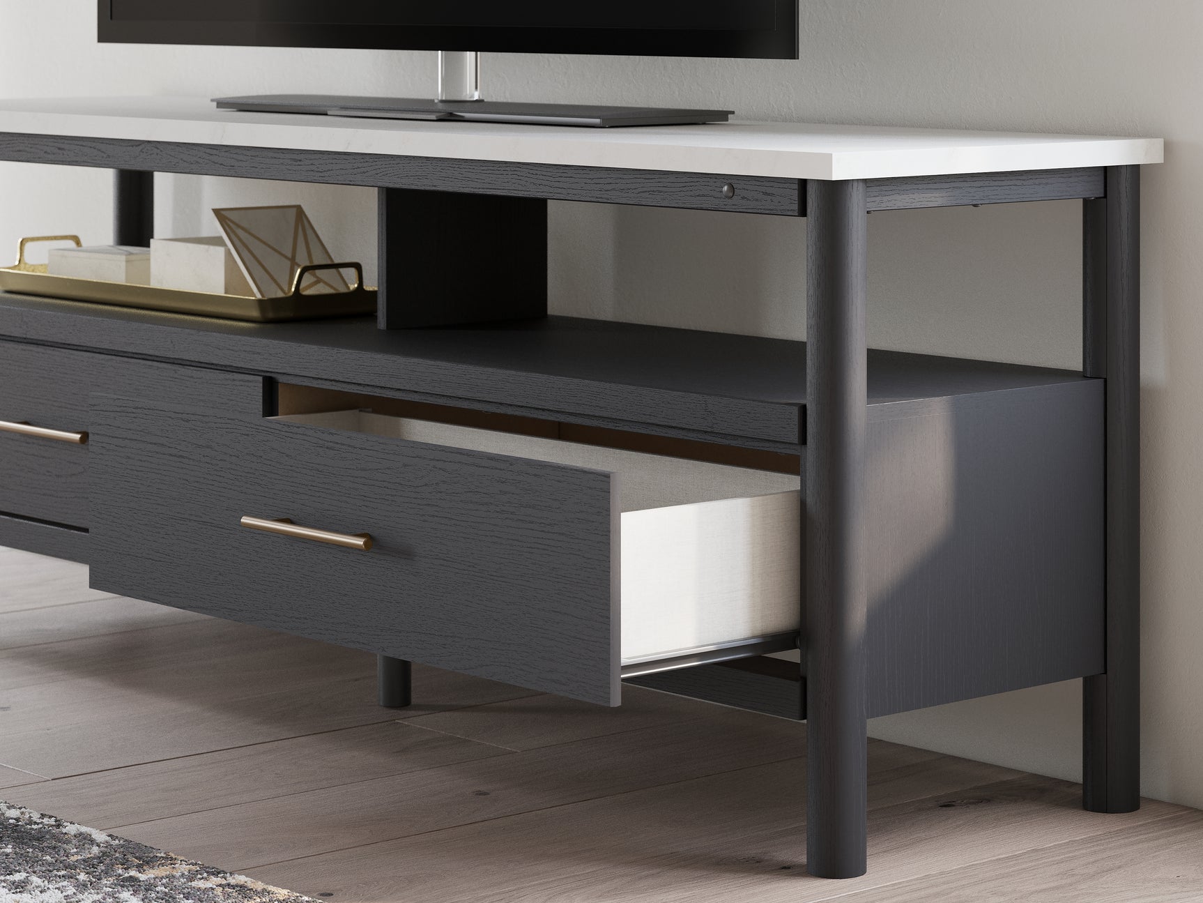 Decorative elements on Cadmori TV stand surface