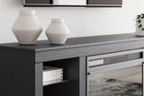 Cayberry TV stand with media components on shelves