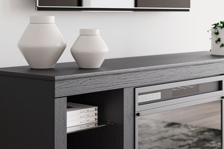 Cayberry TV stand with media components on shelves