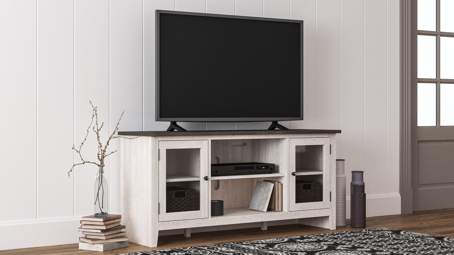 Dorrinson Two-tone 60-inch TV Stand lifestyle setting with TV
