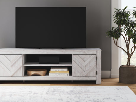 Open cabinet view of Cayboni TV stand with media devices