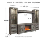 Wynnlow entertainment center assembled in modern living room