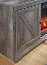 Close-up of rustic wood grain finish on Wynnlow TV stand